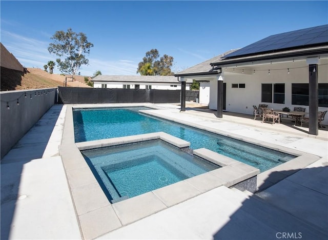 1204 Arbenz Cir, Corona, CA 92881 - view of pool with a fenced backyard, a patio area, and a pool with connected hot tub