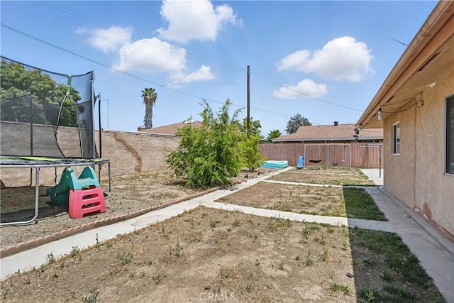 260 E Whittier Ave, Hemet, CA 92543 - fenced backyard with a trampoline