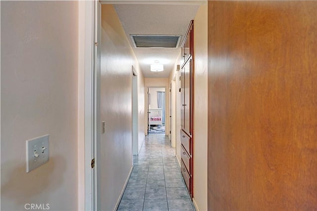 260 E Whittier Ave, Hemet, CA 92543 - corridor featuring tile patterned flooring and baseboards