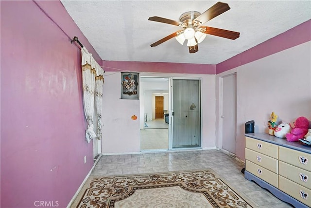 260 E Whittier Ave, Hemet, CA 92543 - bedroom with a textured ceiling and ceiling fan