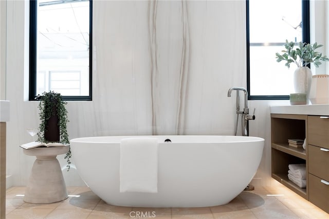 316 32nd St, Manhattan Beach, CA 90266 - bathroom featuring tile patterned flooring, a freestanding tub, and vanity