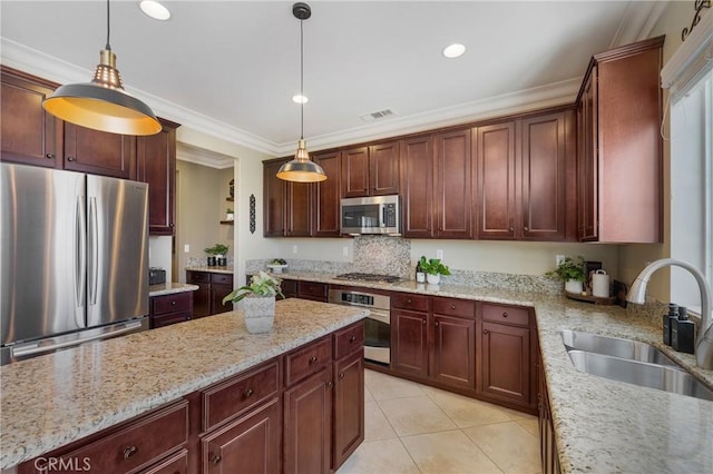33976 Galleron St, Temecula, CA 92592 - kitchen with stainless steel appliances, light tile patterned flooring, pendant lighting, light stone countertops, and recessed lighting