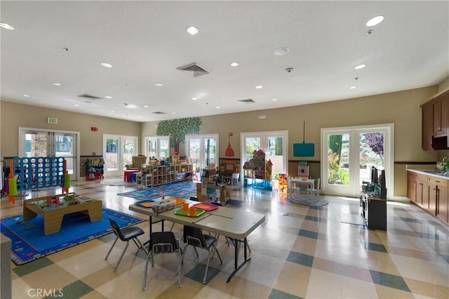 33976 Galleron St, Temecula, CA 92592 - dining room with recessed lighting, light floors, and french doors