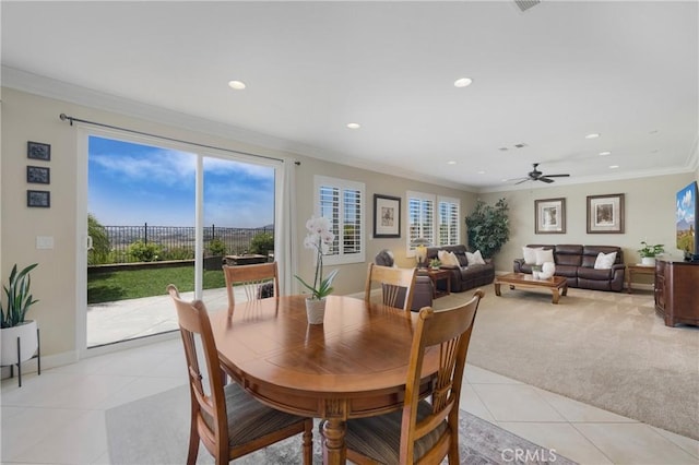 33976 Galleron St, Temecula, CA 92592 - dining room with light tile patterned flooring, recessed lighting, light colored carpet, ornamental molding, and a ceiling fan