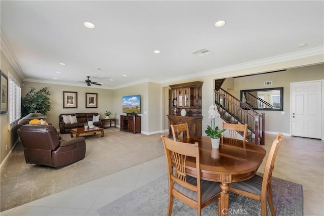 33976 Galleron St, Temecula, CA 92592 - dining room with light colored carpet, recessed lighting, stairway, light tile patterned flooring, and ornamental molding
