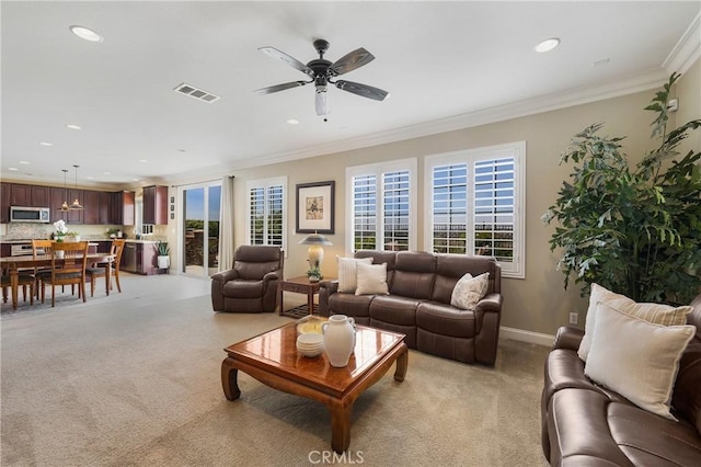 33976 Galleron St, Temecula, CA 92592 - living room with light colored carpet, recessed lighting, plenty of natural light, ornamental molding, and a ceiling fan