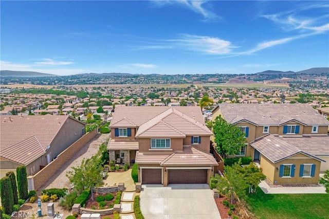 33976 Galleron St, Temecula, CA 92592 - aerial perspective of suburban area with a mountainous background