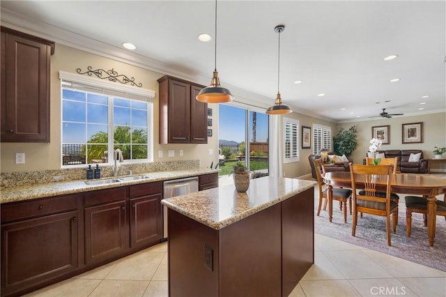 33976 Galleron St, Temecula, CA 92592 - kitchen featuring light tile patterned floors, a center island, ornamental molding, recessed lighting, and a ceiling fan