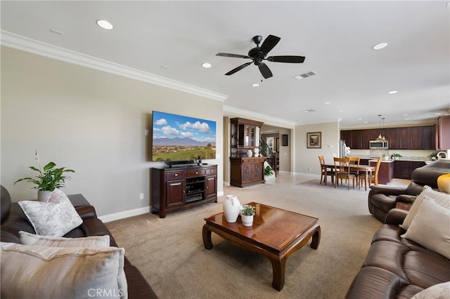 33976 Galleron St, Temecula, CA 92592 - living room featuring light carpet, crown molding, recessed lighting, and a ceiling fan
