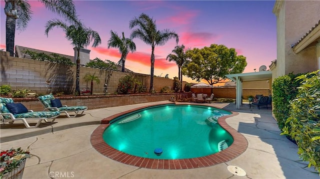 7075 Montana Ave, Fontana, CA 92336 - view of swimming pool featuring a patio and a fenced backyard