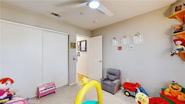 7075 Montana Ave, Fontana, CA 92336 - rec room with carpet and a ceiling fan