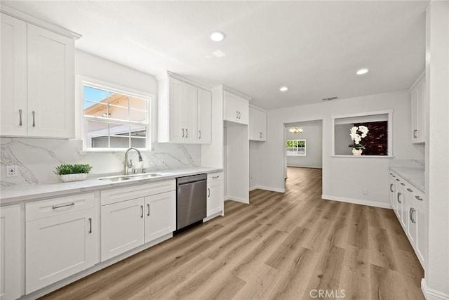 181 W Casad St, Covina, CA 91723 - kitchen with dishwasher, white cabinetry, backsplash, light wood-style floors, and recessed lighting