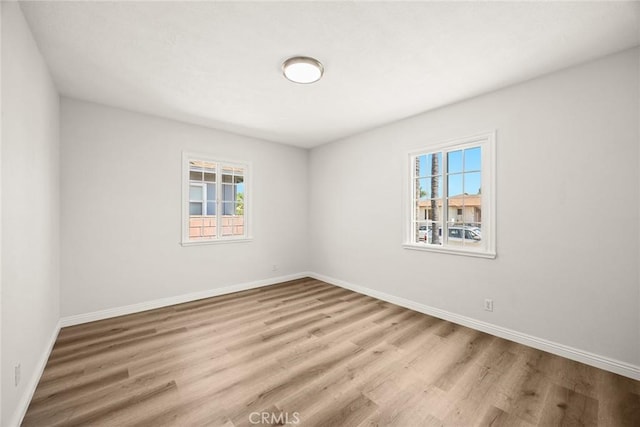 181 W Casad St, Covina, CA 91723 - empty room with plenty of natural light and wood finished floors