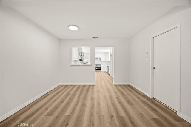 181 W Casad St, Covina, CA 91723 - spare room with light wood-style flooring and baseboards