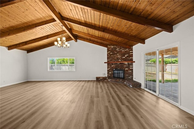 181 W Casad St, Covina, CA 91723 - unfurnished living room with a chandelier, wood finished floors, a fireplace, and wood ceiling