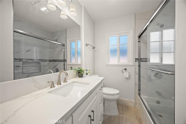181 W Casad St, Covina, CA 91723 - bathroom with vanity, plenty of natural light, and combined bath / shower with glass door
