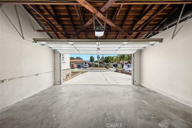 181 W Casad St, Covina, CA 91723 - garage featuring a garage door opener