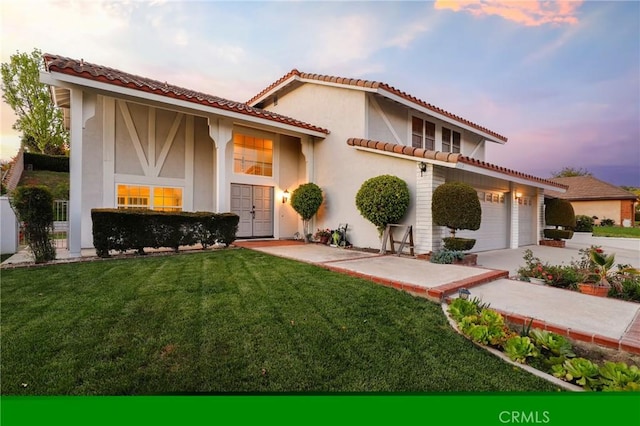 20681 Via Amarilla, Yorba Linda, CA 92886 - view of front of property featuring concrete driveway, stucco siding, a lawn, and a tiled roof