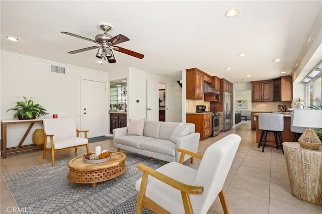 20681 Via Amarilla, Yorba Linda, CA 92886 - living area with light tile patterned floors, ceiling fan, healthy amount of natural light, recessed lighting, and ornamental molding