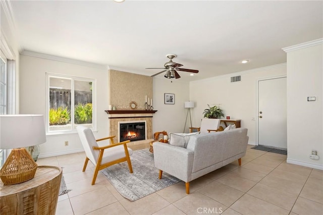 20681 Via Amarilla, Yorba Linda, CA 92886 - living room featuring ceiling fan, light tile patterned floors, a tiled fireplace, ornamental molding, and recessed lighting