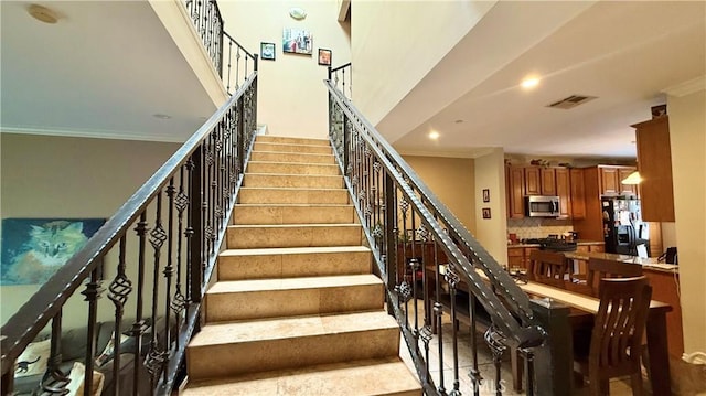 5241 Colodny Dr Unit 403, Agoura Hills, CA 91301 - stairway featuring crown molding and recessed lighting