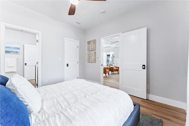 4400 Homer St, Los Angeles, CA 90031 - bedroom with light wood finished floors, a ceiling fan, and ensuite bath