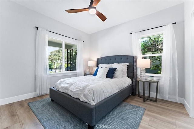 4400 Homer St, Los Angeles, CA 90031 - bedroom featuring multiple windows, wood finished floors, and ceiling fan