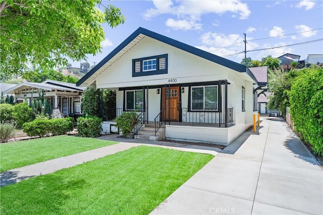 4400 Homer St, Los Angeles, CA 90031 - view of front facade with a porch and a front yard