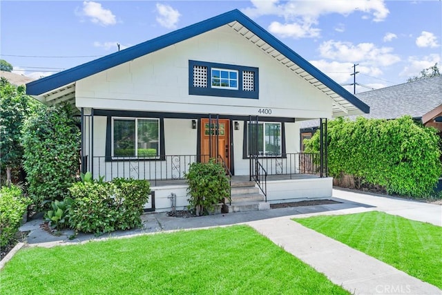 4400 Homer St, Los Angeles, CA 90031 - bungalow-style home with covered porch and a front yard