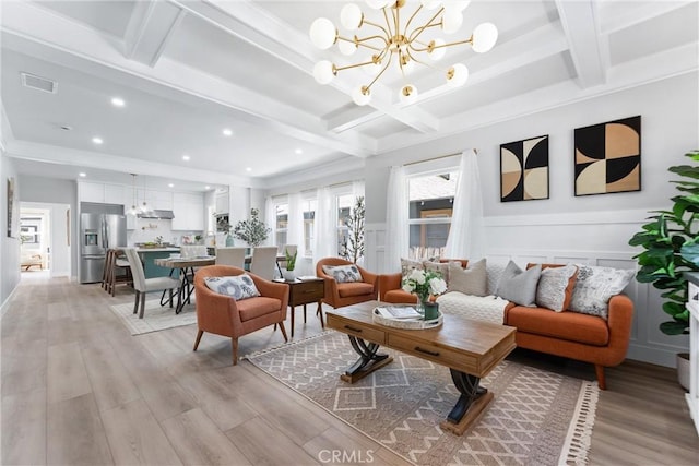4400 Homer St, Los Angeles, CA 90031 - living area featuring coffered ceiling, light wood finished floors, beam ceiling, and a chandelier