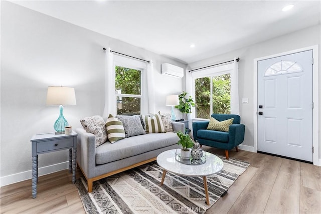 4400 Homer St, Los Angeles, CA 90031 - living area with a wall unit AC, healthy amount of natural light, wood finished floors, and recessed lighting
