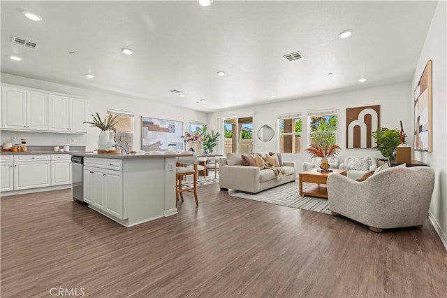 4733 S Rogers Way, Ontario, CA 91762 - living area featuring wood finished floors and recessed lighting