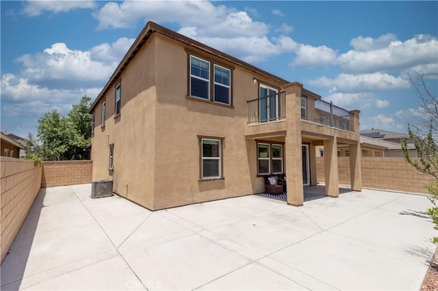 4733 S Rogers Way, Ontario, CA 91762 - back of property featuring a balcony, a patio, stucco siding, and a fenced backyard