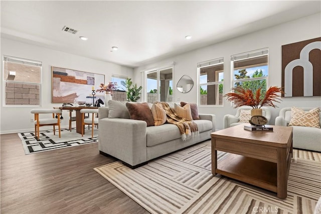 4733 S Rogers Way, Ontario, CA 91762 - living room featuring wood finished floors, plenty of natural light, and recessed lighting