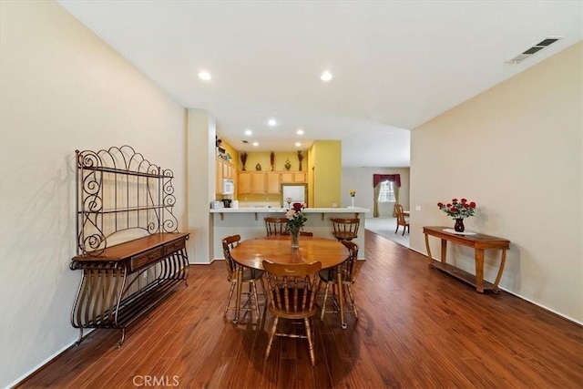 12744 Palmetto Ct, Riverside, CA 92503 - dining area with dark wood finished floors and recessed lighting