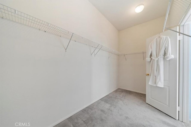 12744 Palmetto Ct, Riverside, CA 92503 - walk in closet with carpet floors