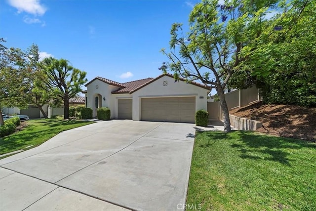 12744 Palmetto Ct, Riverside, CA 92503 - mediterranean / spanish-style house with a garage, stucco siding, driveway, and a tile roof