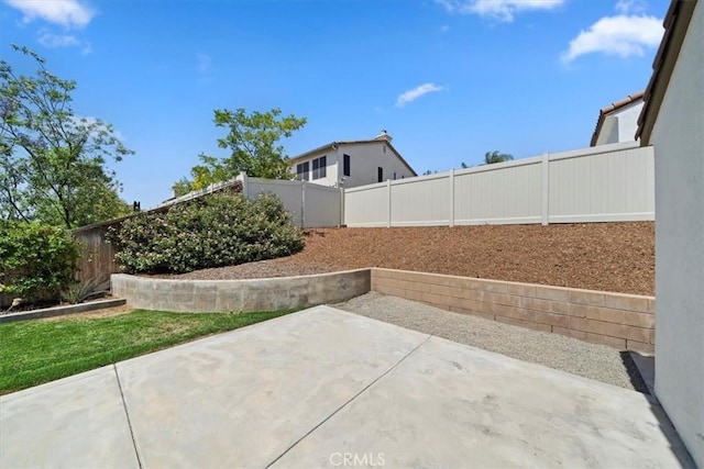 12744 Palmetto Ct, Riverside, CA 92503 - fenced backyard featuring a patio