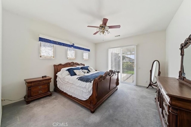 12744 Palmetto Ct, Riverside, CA 92503 - bedroom featuring access to exterior, light colored carpet, and a ceiling fan