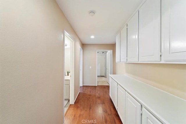12744 Palmetto Ct, Riverside, CA 92503 - hall with wood finished floors and recessed lighting