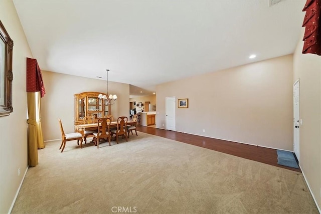 12744 Palmetto Ct, Riverside, CA 92503 - carpeted dining room with a chandelier and recessed lighting