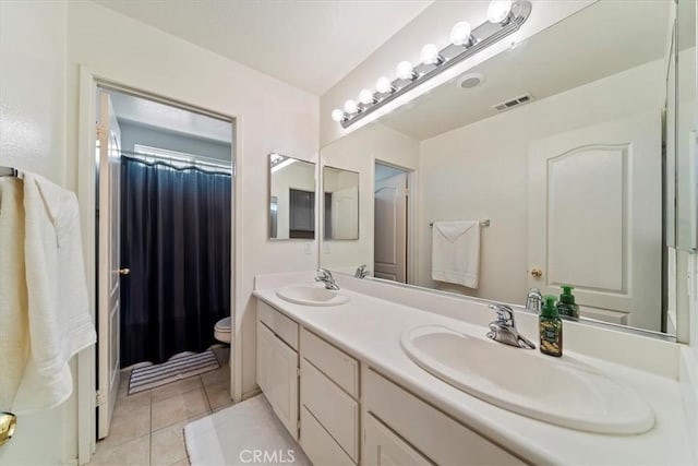12744 Palmetto Ct, Riverside, CA 92503 - full bathroom featuring double vanity, tile patterned flooring, and a shower with curtain