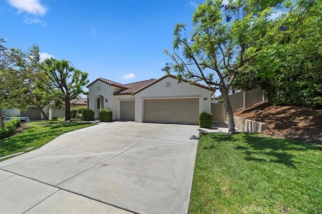 12744 Palmetto Ct, Riverside, CA 92503 - mediterranean / spanish home featuring an attached garage, stucco siding, driveway, and a tile roof