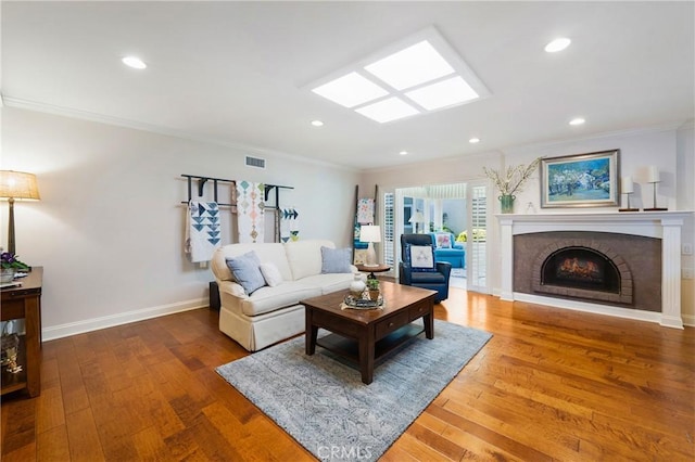 5185 Duenas, Laguna Woods, CA 92637 - living area with ornamental molding, wood-type flooring, a fireplace, and recessed lighting