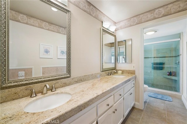 5185 Duenas, Laguna Woods, CA 92637 - full bath with a stall shower, double vanity, and tile patterned flooring