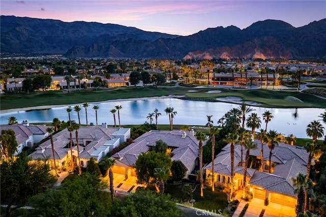 56102 Baltusrol Ln, Quinta, CA 92253 - water view with nearby suburban area and a mountainous background