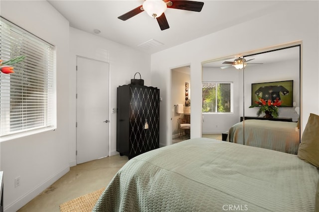 56102 Baltusrol Ln, Quinta, CA 92253 - bedroom with ceiling fan and ensuite bath