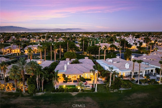56102 Baltusrol Ln, Quinta, CA 92253 - aerial view at dusk of a residential view and a mountain view
