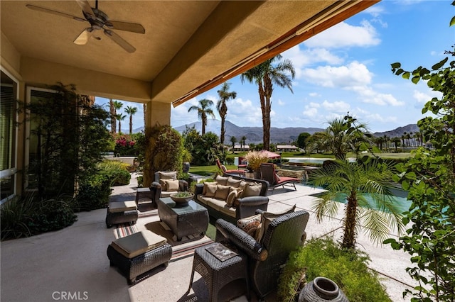 56102 Baltusrol Ln, Quinta, CA 92253 - view of patio with a mountain view, outdoor lounge area, and a ceiling fan