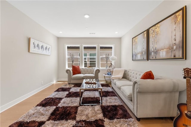 390 Riverbend, Lake Forest, CA 92630 - living area with light wood-style floors and recessed lighting